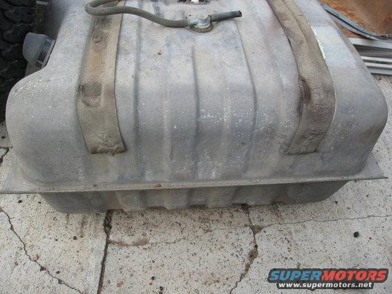 metal fuel tank with straps and fuel line
