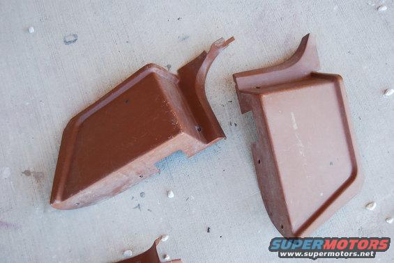 Brown plastic trim pieces on concrete
