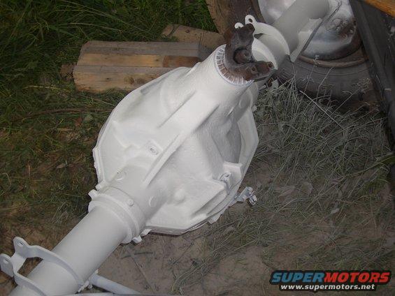 white painted rear axle assembly with driveshaft connection