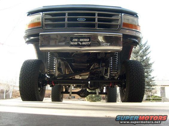 Ford truck front end, lifted suspension, custom bumper with 'EVIL-WICKED MEAN & NASTY' plate