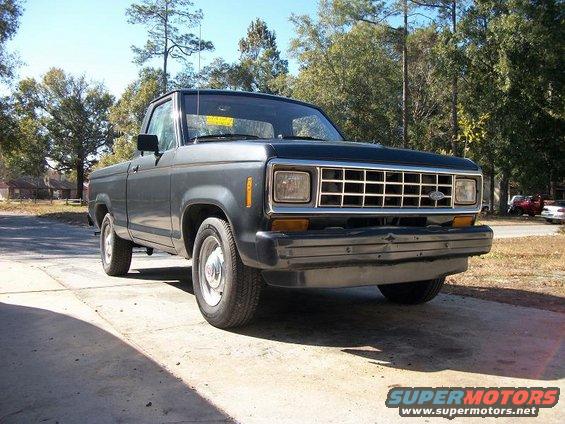 Dark gray 1987 Ford Ranger pickup truck parked on a driveway