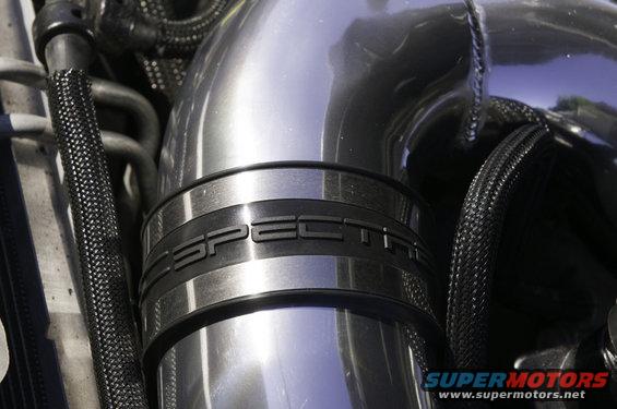 Engine intake tube with Spectre branding