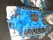 1972 Ford Ranchero - A freshly painted blue V8 engine sits on a workbench, ready for reassembly. The valve covers are off, revealing the internal components.