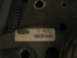 1995 Ford Bronco - A close-up shot shows a label with a Ford logo and alphanumeric characters.