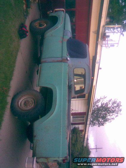 Green pickup truck side view