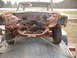 1963 Ford Galaxie - The front end of a heavily rusted 1963 Ford Galaxie is secured to a trailer for transport.