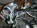 1980 Honda CB750 - Close-up of a motorcycle's instrument cluster and handlebars, showing various wires and components.