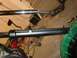 1980 Honda CB750 - Close-up view of motorcycle front forks during a rebuild or repair process.