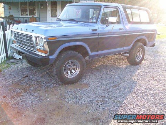 Blue and black 1978 Ford Bronco 3/4 front view