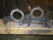 1995 Ford Bronco - Two painted suspension knuckles are shown, likely for a vehicle's front axle.