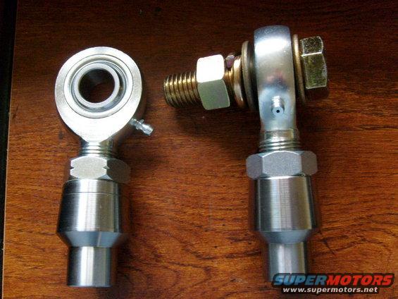 two rod end bearings with threaded shafts