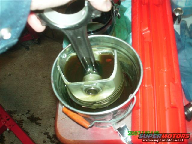 Pistons getting a good soak in oil before going into the hole.