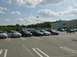 2003 Mazda 6 - Parking lot scene with multiple vehicles, including a 2003 Mazda 6.
