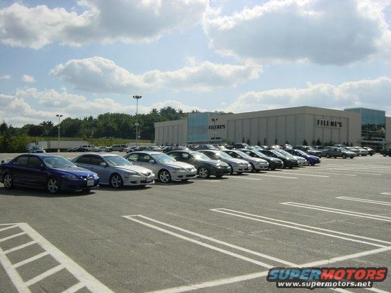 Blue 2003 Mazda 6 parked in a lot with other cars