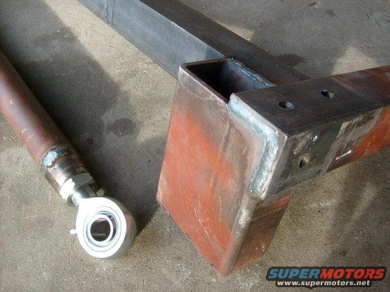 Metal suspension component with rod end bearing and welded steel tubing