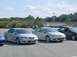 2003 Mazda 6 - Two silver 2003 Mazda 6 sedans are parked in a lot on a sunny day.