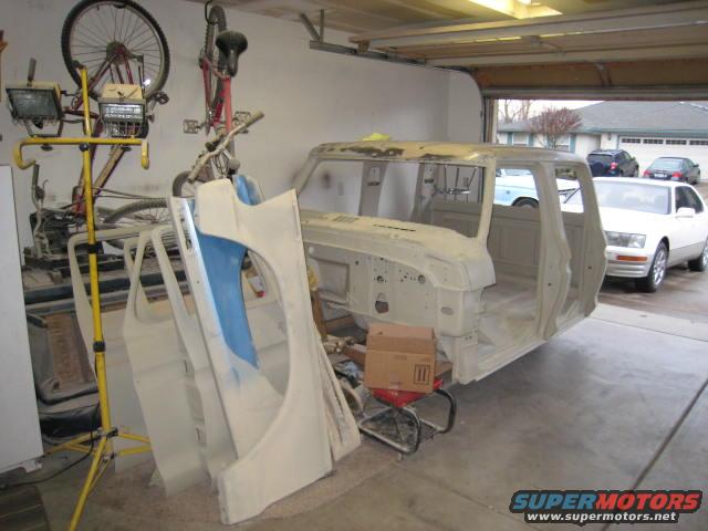 1976 Ford F-250 cab and fender in garage