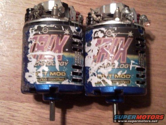 Two brushed RC car motors with 'HPI' and 'GT MOD' labels visible