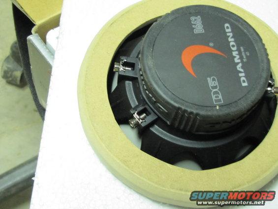 Car speaker with 'DIAMOND D6' text and orange logo, mounted in tan foam ring