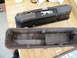 1968 Mercury Cougar - A black valve cover with silver stripes and a cougar emblem is shown disassembled from its gasketed base.