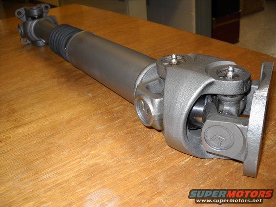 Driveshaft with U-joints and rubber boot
