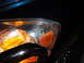 2006 Dodge 2500 - Cracked headlight assembly on a vehicle.