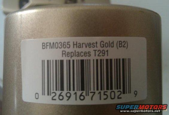 Close-up of a gold-colored part with a white label showing a barcode and text: BFM0365 Harvest Gold (B2) Replaces T291