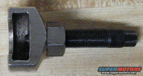 Metal chain breaker tool with a threaded rod and a hexagonal nut