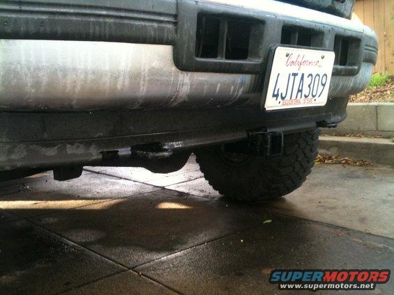 Rear bumper with trailer hitch and California license plate 4JTA309