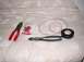 2003 Mazda 6 - Tools and supplies for electrical work are laid out on a patterned surface.
