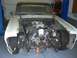 1964 Ford Ranchero - The vehicle's front clip has been removed, exposing the engine and suspension for maintenance or modification.