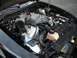 2003 Ford Mustang - Engine bay of a 2003 Ford Mustang Cobra, showing the supercharged V8 engine and intake system.