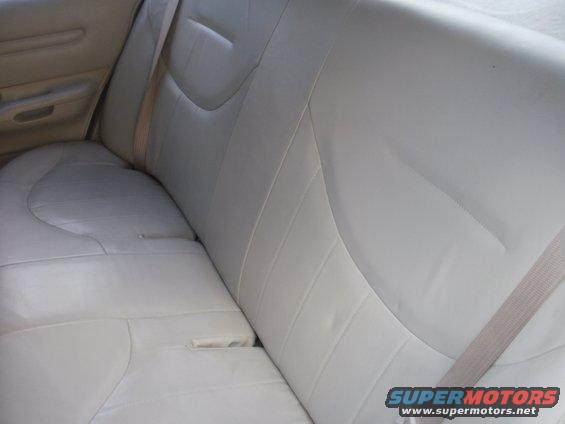 Light gray leather rear seats in a 2002 Ford Crown Victoria
