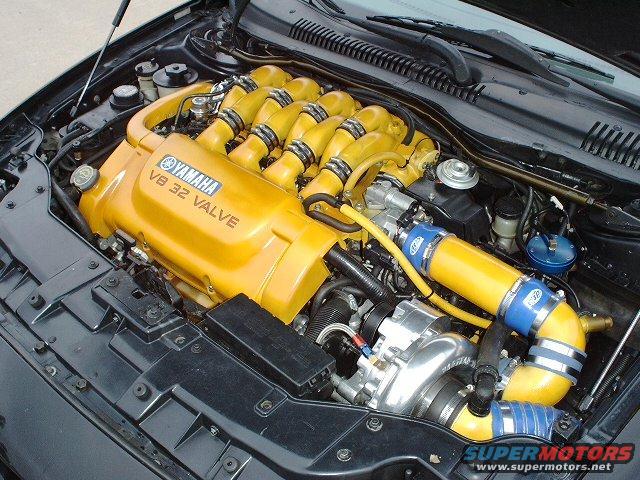 Yamaha V8 32 Valve engine with turbocharger and yellow intake piping