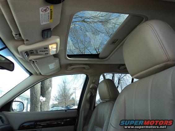 dsc00450.jpg How many Grand Marquis do you see with a sunroof?