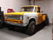1971 International School Bus - This International pickup truck, likely from the early 1970s, is shown in a garage with a two-tone paint scheme.