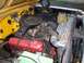 1971 International School Bus - Close-up view of the engine compartment, showing the V8 engine and associated components.