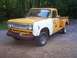 1971 International School Bus - This International pickup truck has a two-tone paint job and appears to be in a state of disrepair.