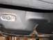 1971 Chevrolet Camaro - Underside view of a vehicle fuel tank showing a fuel line and some surface rust.