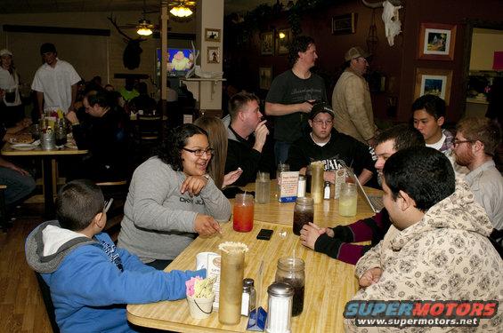 People gathered in a restaurant dining area