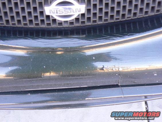 Nissan grille and damaged bumper