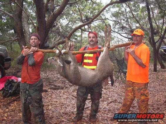 Toby and his uncle in center with Richards super rare Kauai 8 point buck.