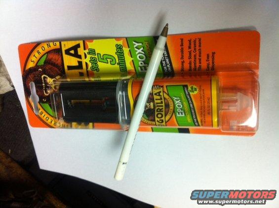 Gorilla Epoxy packaging with a pen on top