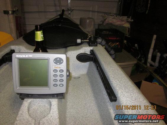 Kayak interior with Eagle fish finder, bottle, and paddle mount
