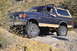 1991 Ford Bronco - This 1991 Ford Bronco is navigating a challenging off-road trail.