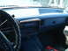 1989 Ford F-250 - Interior view of a 1989 Ford F-250 dashboard, showing the steering wheel and radio.