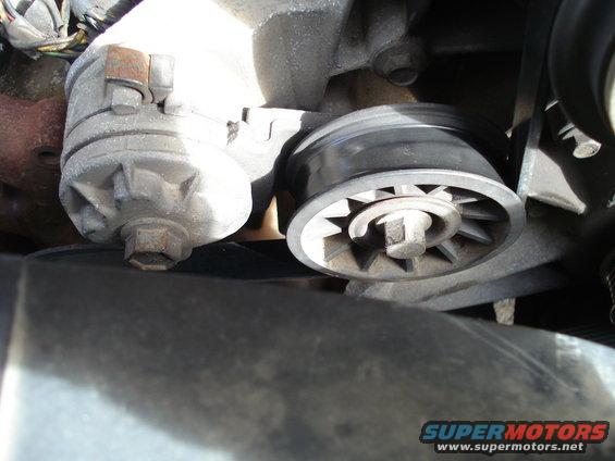 Engine belt tensioner pulley