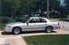 2006 Mercury Grand Marquis - Emma III; silver 1999 Ford Crown Victoria