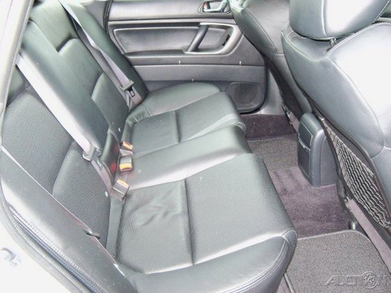 Rear leather seats and floor of a car interior