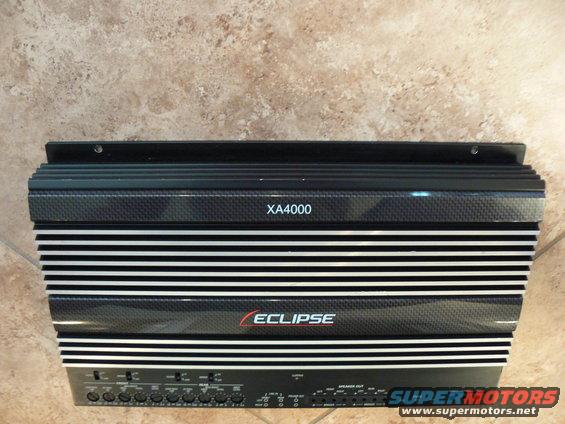 Black Eclipse XA4000 car amplifier with silver fins and carbon fiber accents